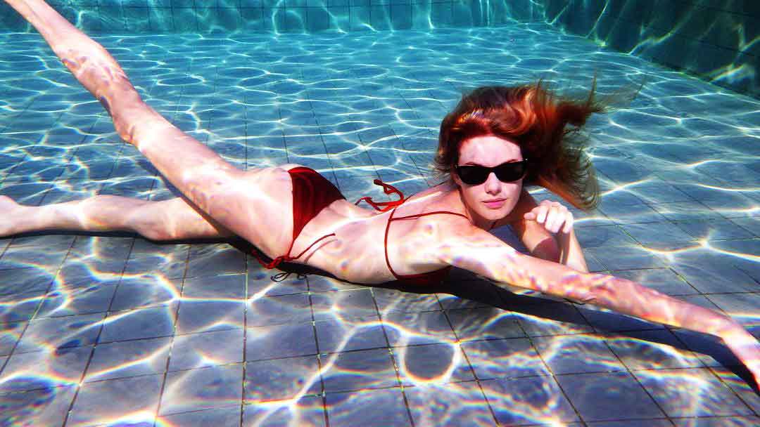 Camille Rowe goes swimming regularly to keep herself fit