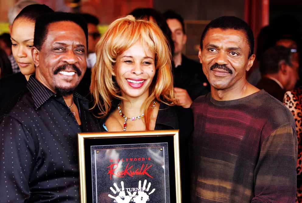 Ike Turner, Audrey Madison, and Ike Turner Jr. at Ike's induction into the Hollywood Rockwalk in Hollywood, California, on April 4, 2005