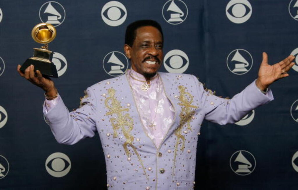 Ike Turner lifting the award at a show