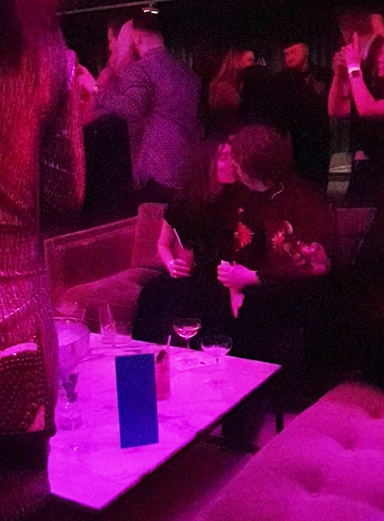 Ellie and Lewis sharing a kiss at the BRIT Awards afterparty